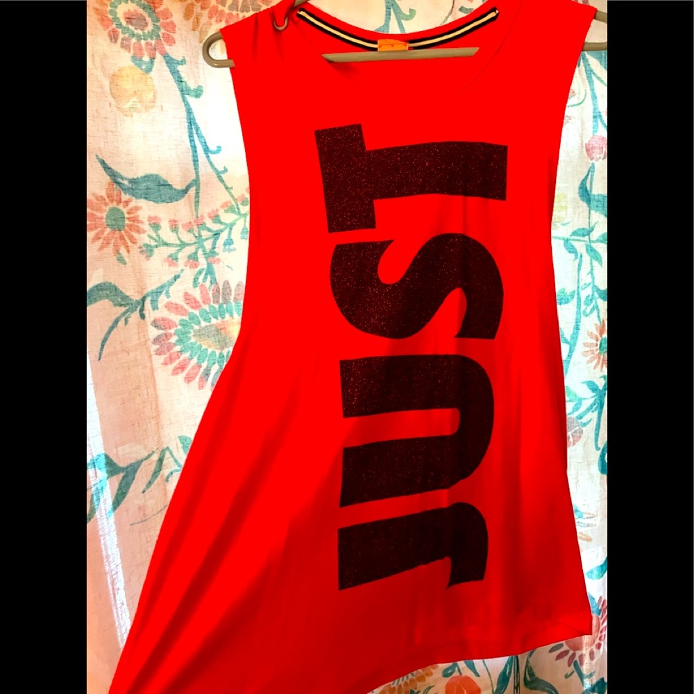 Nike, size medium top, short sleeves, orange, white and black.